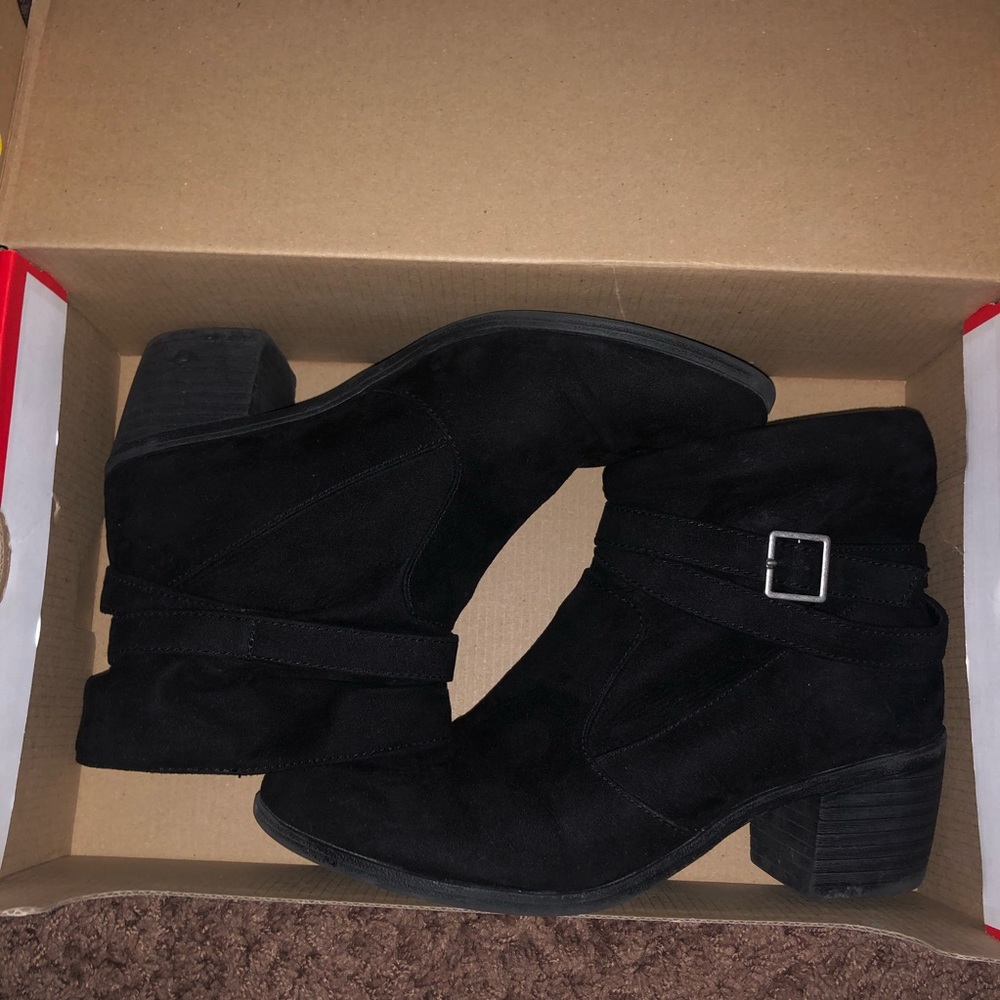 Black suede booties with silver buckle detail
